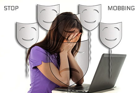 woman sitting near laptop thumbnail