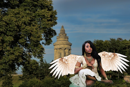 Female dressed up as Angel thumbnail