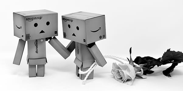 grayscale photo of toys and flower thumbnail