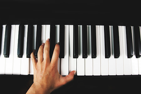Man playing piano keyboard thumbnail