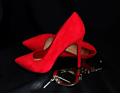 pair of red suede heeled point toe shoes thumbnail