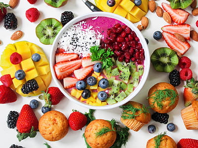 Assorted Sliced Fruits in White Ceramic Bowl thumbnail