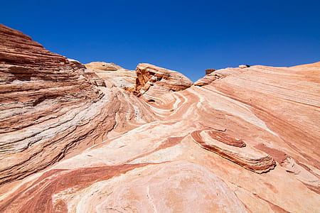 rock formation under blue sky thumbnail