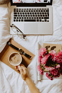 Morning coffee in bed. Working in bed thumbnail