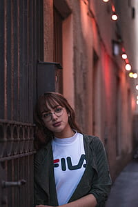 woman leaning on security gate thumbnail