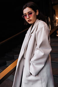 woman wearing white coat thumbnail