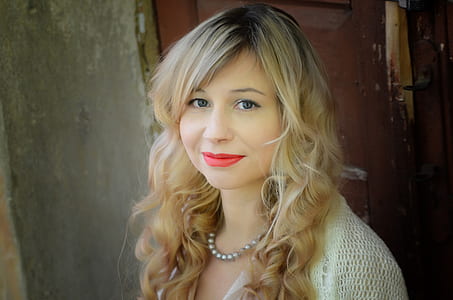 woman wearing white knit dress thumbnail
