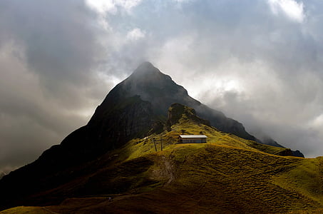 white house on top of mountain thumbnail