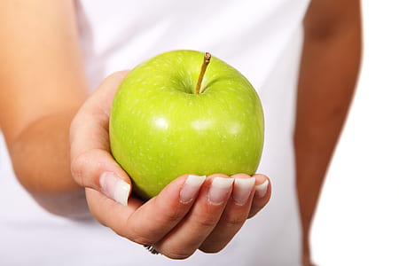 person holding green apple thumbnail
