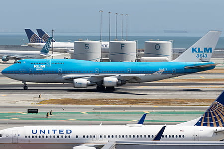 white and blue KLM Asia plane thumbnail