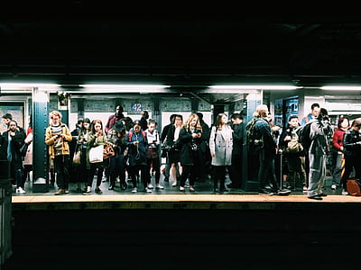 group of person standing on subway thumbnail