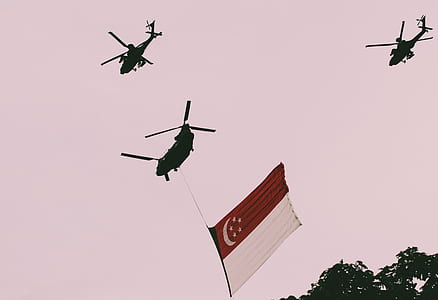 three chopper carrying Singapore flag thumbnail