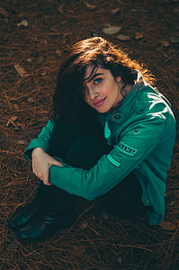 Woman Sitting on the Ground thumbnail