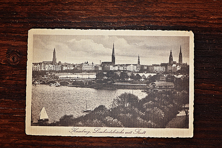 grayscale photo of city on brown surface thumbnail
