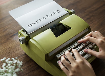 person typing on typewriter thumbnail