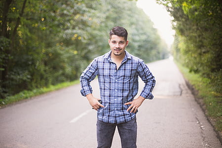 man wearing blue and black plaid sport shirt thumbnail