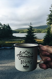 white and black ceramic mug thumbnail