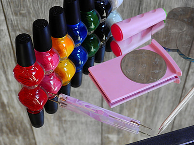 assorted nail polish bottles on table thumbnail
