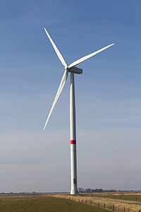white windmill on field during daytime thumbnail
