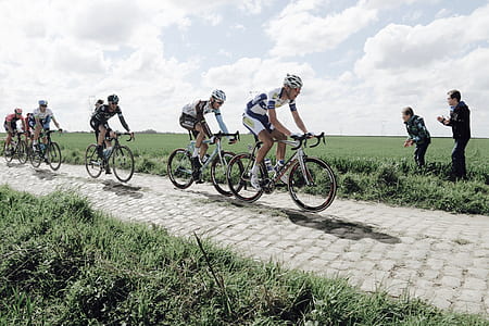 men riding road bike doing bike racing thumbnail
