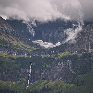 aerial photography of mountain and white clouds thumbnail
