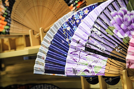 closeup photo of assorted-color hand fans thumbnail