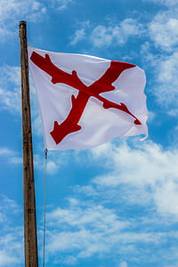 white and red Flag in closeup photo thumbnail