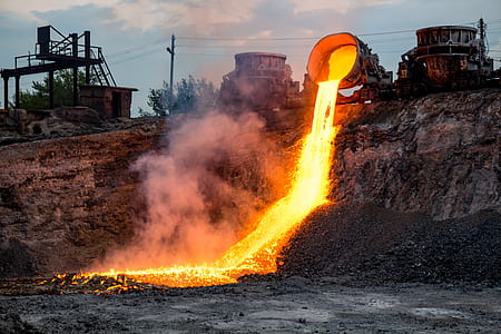 time lapse photography of lava pouring on gravel thumbnail