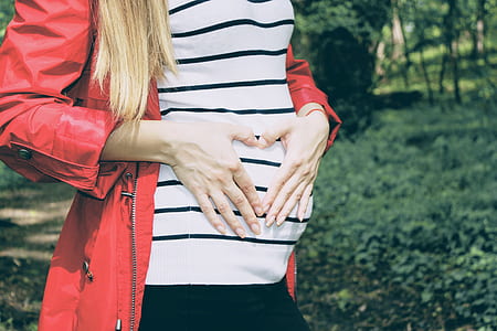 person holing tummy thumbnail