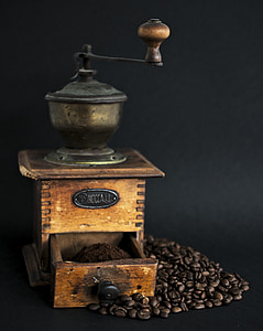 vintage manual coffee grinder in shallow focus photography thumbnail