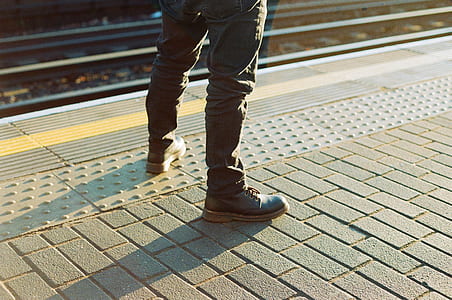 person standing on concrete floor thumbnail