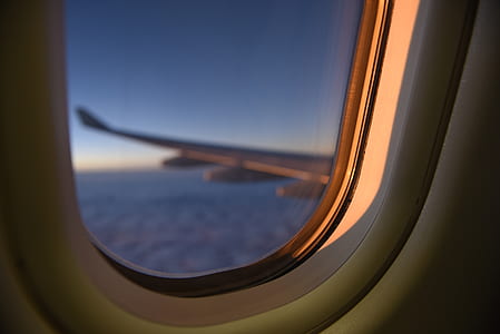 airplane view of airplane wing in the sky thumbnail