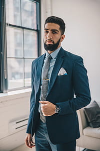 Man In Tailored Suit Photo thumbnail