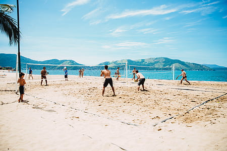 group of men playing beach ball thumbnail