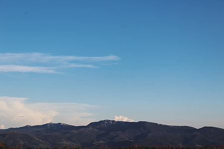 mountain under blue sky thumbnail