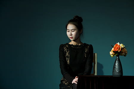 woman sitting at front of table thumbnail