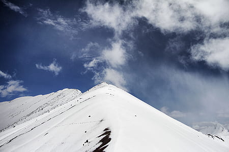 snow mountain under white clouds thumbnail
