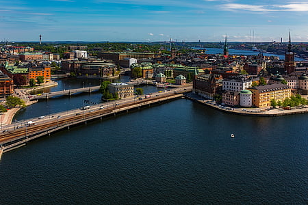 aerial photo of cities near sea thumbnail