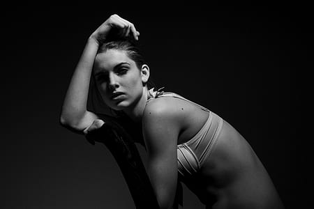 grayscale photo of woman wearing bra thumbnail