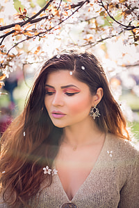 photography of woman under tree with flower thumbnail