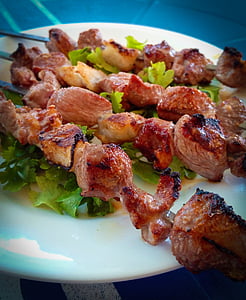 meat barbecue on skewer in close-up photography thumbnail