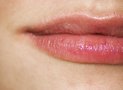 close up photo of person's lips thumbnail
