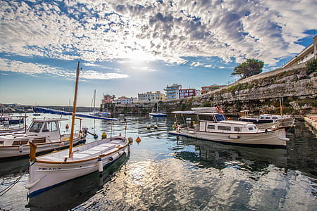 white yacht on the body of water thumbnail