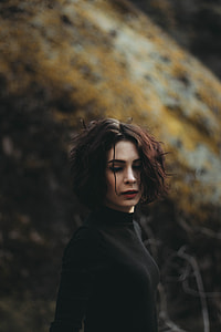 woman wearing black turtle neck sweater thumbnail