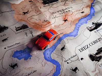 red car diecast on map thumbnail