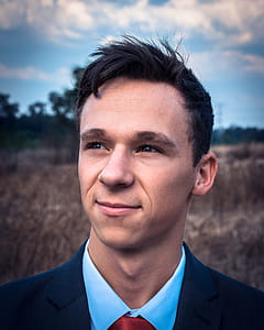 Close-Up Photography Of Smiling Man thumbnail