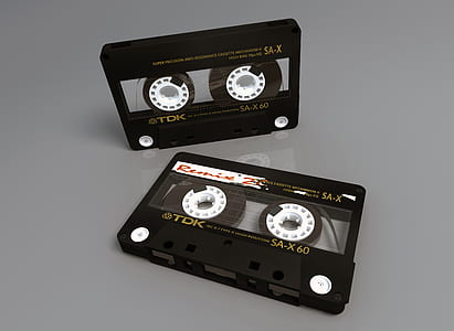 two black TDK compact cassettes thumbnail
