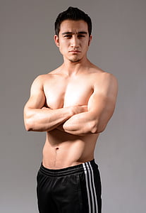 man wearing black and white bottoms thumbnail