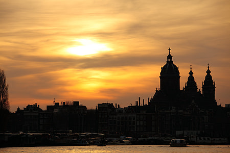 silhouette of a cathedral during golden hour thumbnail