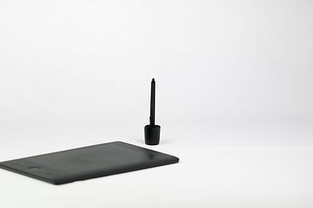 graphics tablet beside pen thumbnail